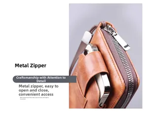 Macro detail of brown litchi pattern leather clutch with smooth metal zipper and phone slot
