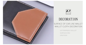 Macro shot of bifold leather wallet showing black and brown contrast stitching details