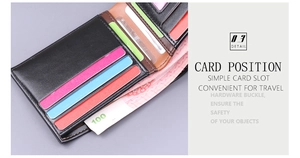 Detail view of black leather men's wallet with multi-color card slots and metal snap closure