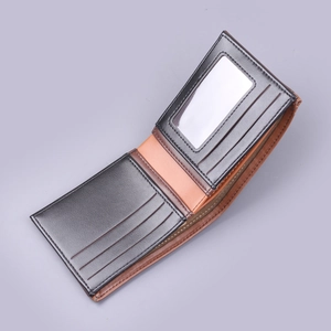 Classic bi-fold men's leather wallet featuring a sleek black and brown contrast design