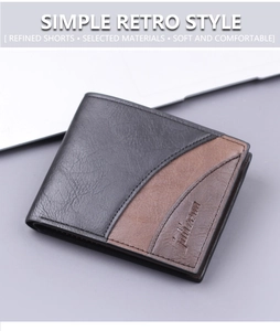 Detail of bifold men's wallet in black lychee leather with brown embossed logo panel