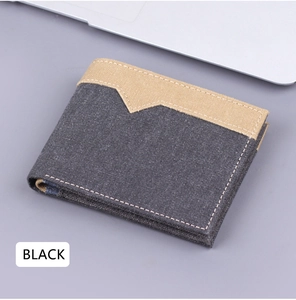 Gros plan d'un portefeuille bicolore en toile pour hommes en noir et kaki avec coutures