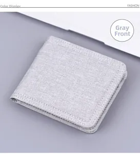 Detail of grey canvas men wallet showing durable fabric texture and neat edge stitching
