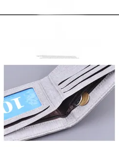Detail of canvas men's wallet interior with card slots, ID window, and zipper pocket