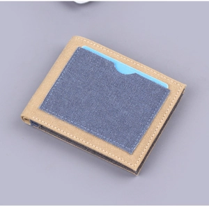 Detailed texture of bi-color canvas folding wallet featuring blue exterior card slot