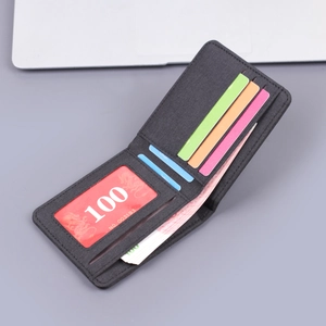 Men's bifold canvas wallet with multiple card slots and clear ID window in black finish