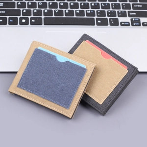 Slim canvas bi-fold wallets for men featuring contrasting card slots and heavy stitching