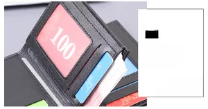 Detail of precise stitching on black men's wallet featuring vertical card slots