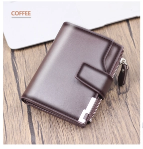 Detailed close-up of dark coffee leather wallet with snap button and side zipper on wood