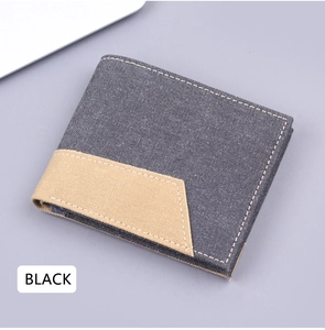 Gros plan d'un portefeuille en toile anthracite pour hommes avec des coutures kaki