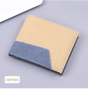 Détail du portefeuille en toile kaki et bleu denim avec coutures résistantes