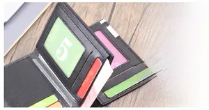 Detailed interior of a black leather wallet with multiple card slots and an ID window