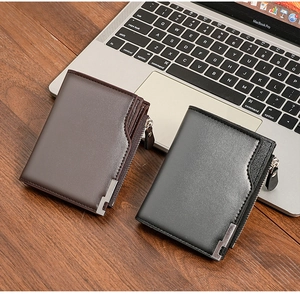 Business style men's leather wallets in dark coffee and black on a wooden desk