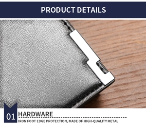 Close-up of black lychee grain leather wallet with silver metal edge protection hardware