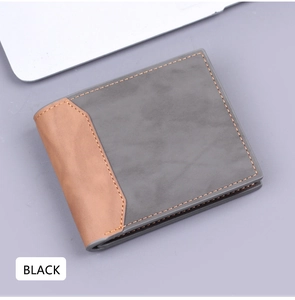 Detail shot of men's bi-fold wallet featuring grey and brown contrast leather textures