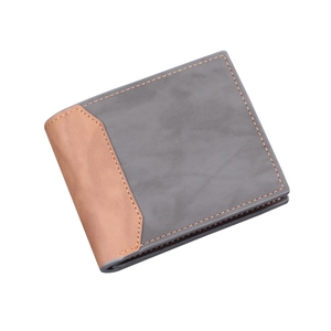 Men's bifold short wallet in navy and brown matte leather with contrast stitching