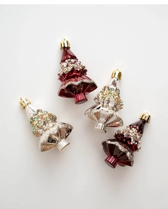 Detailed view of red and champagne silver Christmas tree ornaments with glitter details