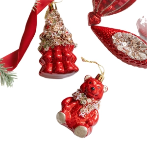 Christmas tree ornaments set featuring red teddy bear and festive shapes with gold glitter
