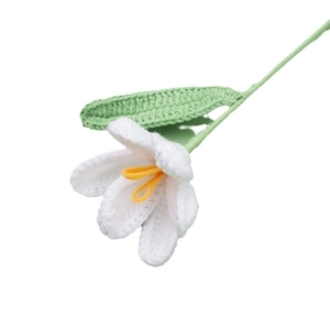 Handmade crochet lily of the valley flower branch with white knit petals and green stem