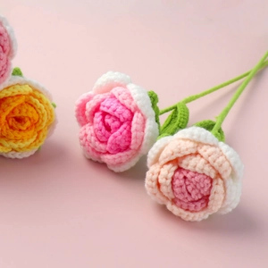 Handmade crochet roses in multi-color yarn for home decor and romantic gifts