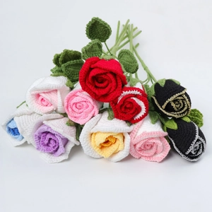 Detailed close-up of handmade crochet rose bouquets in various colors and soft yarn textures
