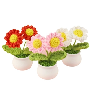 Three handmade crochet daisy potted plants in red, pink and white for home and car decor