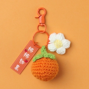 Handmade knitted persimmon keychain with orange fruit charm and lucky tag for bag decor