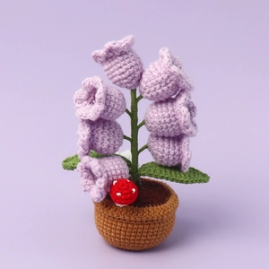 Handmade crochet lily of the valley lamp with purple flowers and a small mushroom
