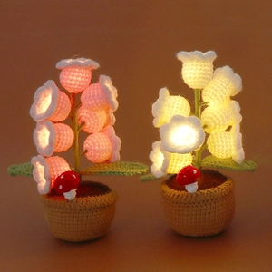 Handmade Lily of the Valley crochet night light in a pot with warm glowing LED effect