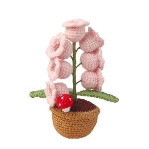 Handmade crochet lily of the valley lamp with pink flowers and a small mushroom