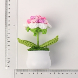 Handmade crochet pink flower pot with ruler showing 11.5cm height and 10.5cm width