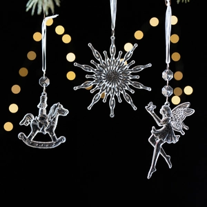 Set of clear Christmas ornaments featuring snowflake, angel, and rocking horse shapes
