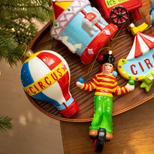 Christmas circus resin ornaments set with carousel and hot air balloon on wooden tray
