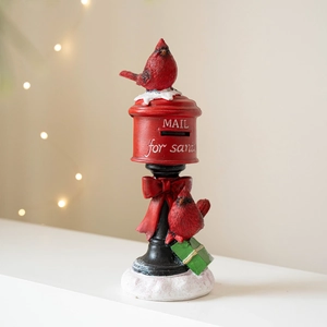 Christmas resin ornament featuring a red Santa mailbox with cardinals on a snowy base