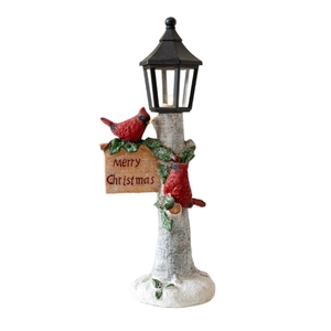 Resin Christmas lamp post decoration with red cardinals and Merry Christmas sign