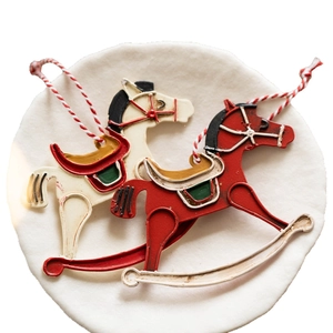 Vintage style red and white rocking horse ornaments with rustic finish for Christmas tree