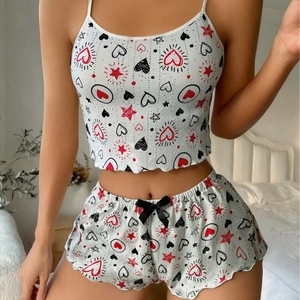 Women's heart and star print knit cami pajama set with ruffle hem shorts and bow