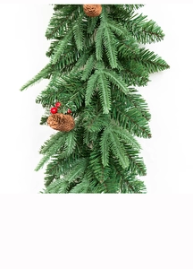 Detail of 2.7m snow-flocked Christmas garland with pine cones and red berries