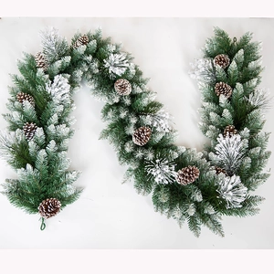 2.7m frosted Christmas garland with snow flocking and pine cones for holiday decor