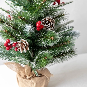 60cm tabletop Christmas tree with snow-flocked needles, red berries and pine cones
