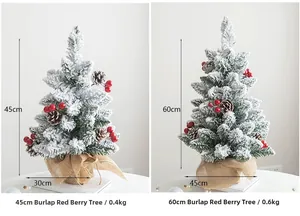 Details von 45cm und 60cm verschneiten Weihnachtsbäumen mit roten Beeren und Zapfen