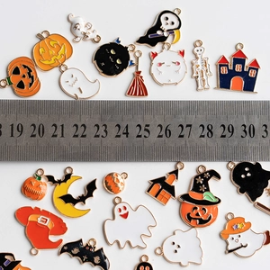 24pcs Halloween enamel alloy charms set featuring pumpkin and ghost motifs with scale