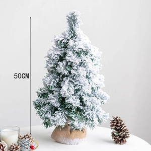 Flocked 50cm tabletop Christmas tree with artificial snow and natural burlap base