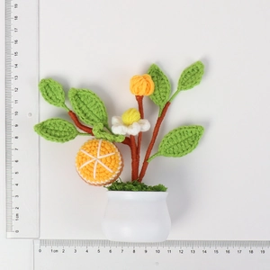 Handmade crochet orange potted plant for festive gifts and home decor with measurements