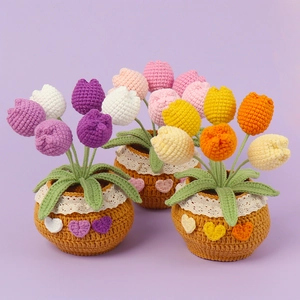 Handmade crochet tulip and rose potted plants for home desktop decor with woven details