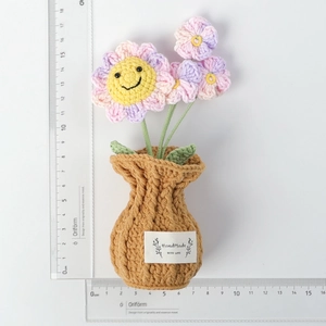 Handmade crocheted purple sunflower potted plant with cute smile face and handmade label
