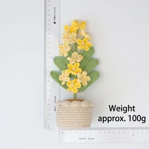 Crochet yellow flower pot display showing dimensions 26cm height and 14cm width