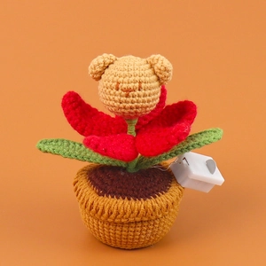 Handmade crochet bear potted plant ornament with integrated glowing LED light component