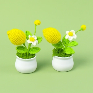 Handmade crochet lemon potted plant with white flower in white ceramic pot home decor