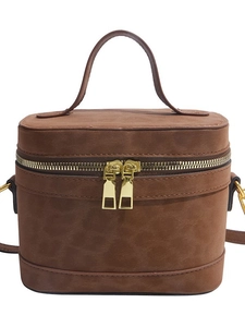 Sac seau vintage marron avec poignée supérieure et fermetures éclair dorées